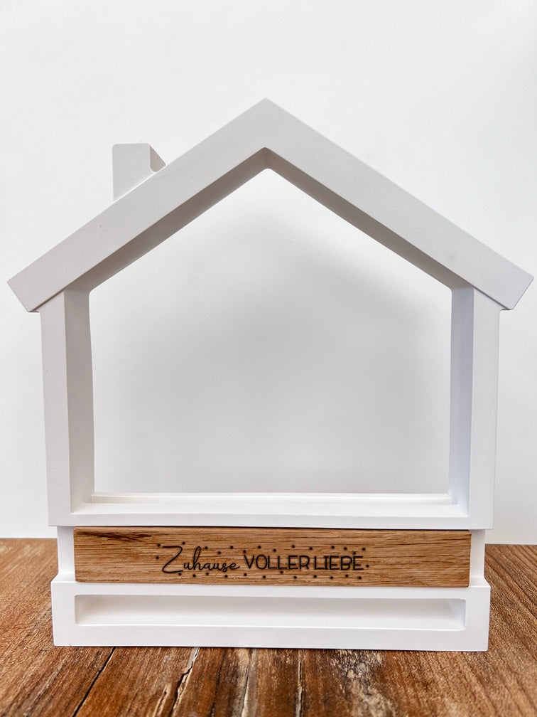 Haus mit Holzklötzchen