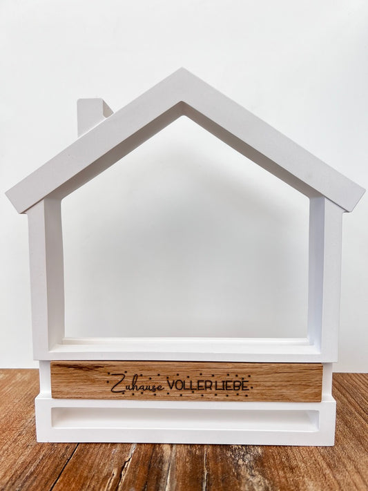 Haus mit Holzklötzchen